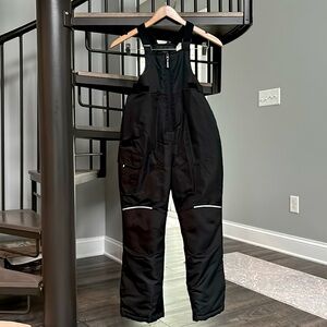 A kids, black Swiss tech ski suit.